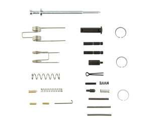 Assortment of small metal and plastic components (springs, pins, rings, and rods) laid out in rows on a white background.