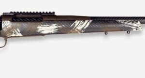 Camouflage-pattern bolt-action hunting rifle with long barrel on a white background, no scope attached.