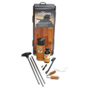 Shotgun cleaning kit with case, rods, brushes, patches, solvent and oil laid out for maintenance example.
