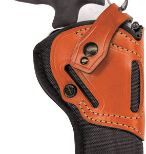 Pistol in an orange-brown leather holster with black fabric backing, grip visible.