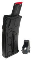 Black high-capacity pistol magazine with a red top and a separate gray magazine loader beside it.