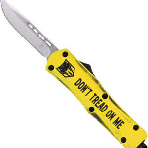 Folding knife with a yellow handle bearing the slogan DON'T TREAD ON ME and a partially extended blade.