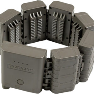 Gray modular connector blocks arranged in a circular ring, exposing metal pins and interlocking sides for plug-in connections.