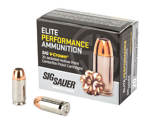 Box of SIG SAUER Elite Performance ammunition (V-Crown) with two copper hollow-point cartridges beside it.
