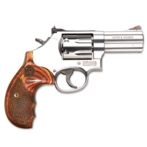 Silver revolver with a wooden grip labeled Smith & Wesson, showing a six-shot cylinder and hammer.