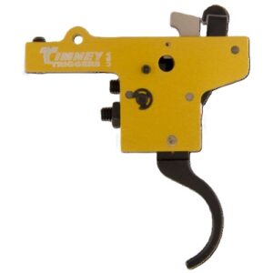 Yellow metal trigger mechanism with a curved black lever, isolated on a white background, labeled Turney Triggers.