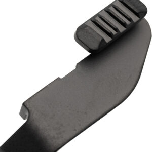 Close-up of a black curved metal tool with a grooved rubber thumb pad on the end