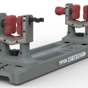 Dual gun vise on a gray base with red clamps, used to hold firearms for maintenance and gunsmithing.