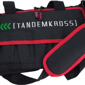 Tandemkross black bag with red trim, padded pocket, and adjustable shoulder strap.