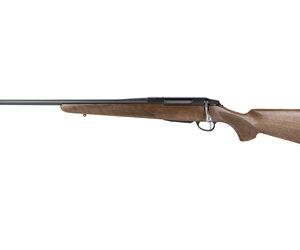 Bolt-action hunting rifle with wooden stock and long metal barrel.