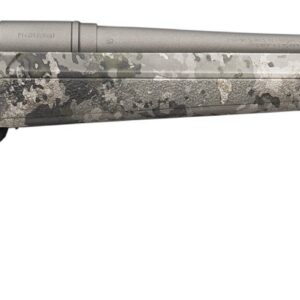 Camouflage bolt-action rifle with a long barrel and muzzle brake, lying horizontally on a white background