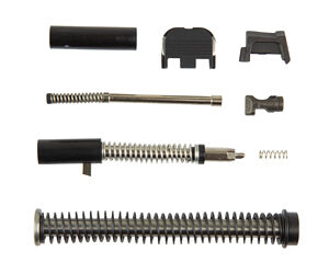 Exploded view of a disassembled screw and spring assembly with caps, guides, and a long threaded rod laid out in sequence.