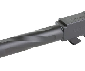 Long gray firearm suppressor attached to the muzzle of a rifle, showing the mounted attachment and cylindrical silencer.