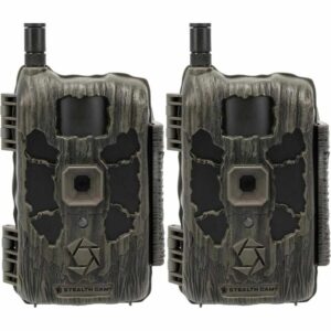 Two camouflage Stealth Cam trail cameras placed side by side, facing forward.