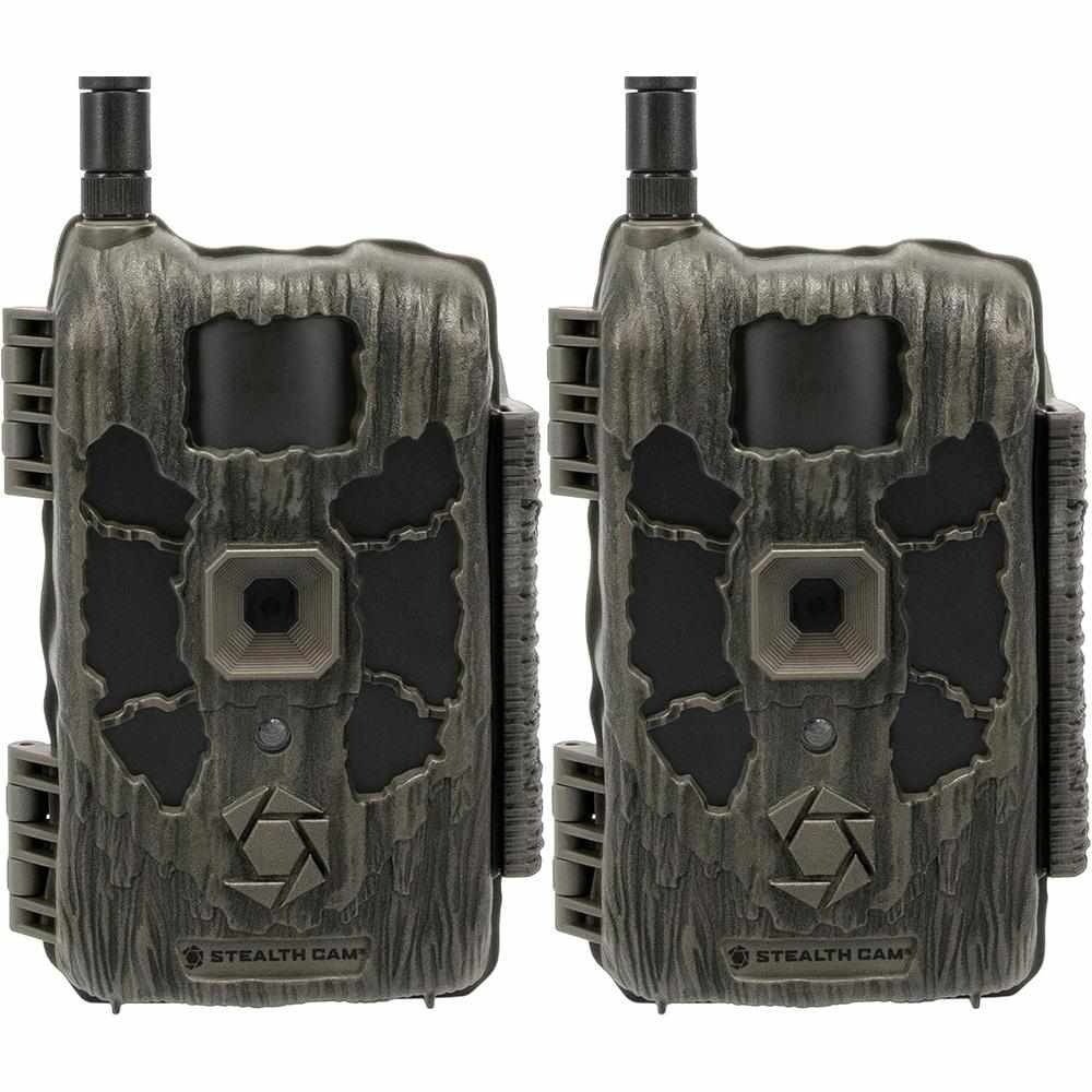 Two camouflage Stealth Cam trail cameras placed side by side, facing forward.