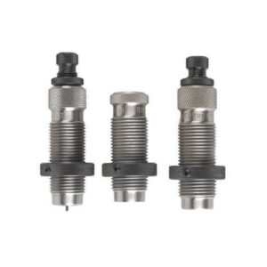 Three metal knurled hydraulic/pneumatic fittings with threaded ends, lined up in a row.