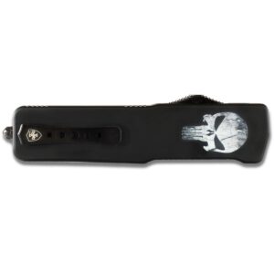 Black pocket lighter with a white skull graphic on the body.