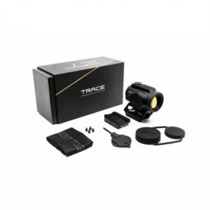 Black compact optical sight with mounting accessories and caps, shown with a TRACE box and included extras (battery, screws, pouch, cloth).